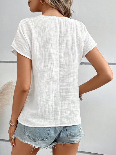 Olga – Damska bluzka z krótkim rękawem, która rozjaśni dzień